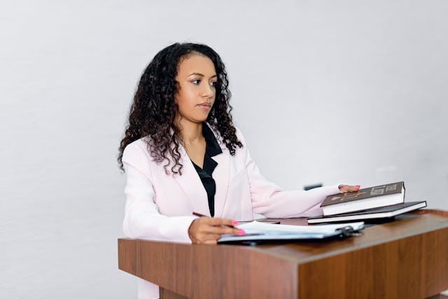 Witness participating in a remote deposition, demonstrating effective body language and professional video setup.